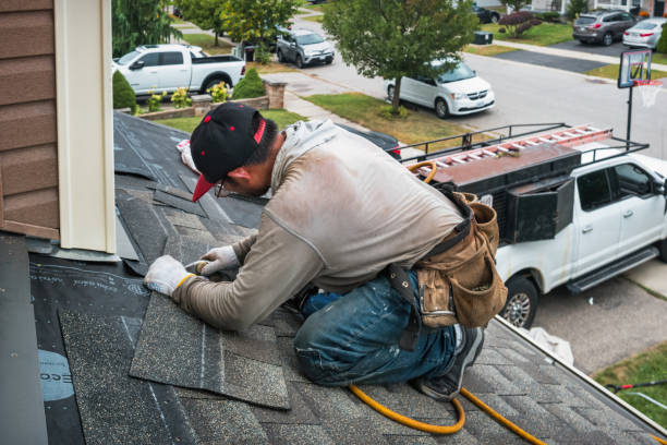 Professional Gutter Installation technician working in Miami, FL